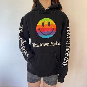 Chinatown Market Black Hoodie with Rainbow Smiley Logo